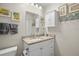 Clean bathroom with granite countertop and updated vanity at 5958 Clubside Dr, Sarasota, FL 34243