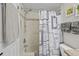 Updated bathroom with tub/shower combo and modern fixtures at 5958 Clubside Dr, Sarasota, FL 34243