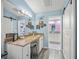 Updated bathroom with granite vanity and double sinks at 5958 Clubside Dr, Sarasota, FL 34243