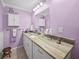 Bathroom with granite countertop, updated vanity, and walk-in shower at 5958 Clubside Dr, Sarasota, FL 34243