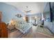 Large main bedroom with a king-size bed, and plenty of natural light at 5958 Clubside Dr, Sarasota, FL 34243