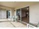 Screened balcony with sliding doors to interior at 6507 Stone River Rd # 306, Bradenton, FL 34203