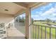 Screened balcony overlooking a golf course and pond at 6507 Stone River Rd # 306, Bradenton, FL 34203