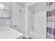 Clean bathroom with a tub, shower, and white vanity at 6507 Stone River Rd # 306, Bradenton, FL 34203