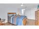Light and airy bedroom with a dresser and en-suite bathroom access at 6507 Stone River Rd # 306, Bradenton, FL 34203