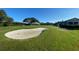 Picturesque golf course with sand trap and clubhouse at 6507 Stone River Rd # 306, Bradenton, FL 34203