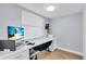 Bright home office features built-in desk and window at 6507 Stone River Rd # 306, Bradenton, FL 34203