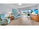 Relaxing living room with ample seating and view at 6507 Stone River Rd # 306, Bradenton, FL 34203