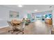 Spacious living room with comfy seating and golf course view at 6507 Stone River Rd # 306, Bradenton, FL 34203