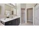 Contemporary bathroom featuring a vanity with modern hardware and a glass-enclosed shower at 6510 42Nd E St, Sarasota, FL 34243