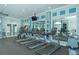 Well-equipped fitness center with modern treadmills, televisions, and ample mirror space at 6510 42Nd E St, Sarasota, FL 34243