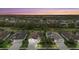 Community overview featuring upscale homes and landscaping at 6519 Rosehill Farm Run, Bradenton, FL 34211