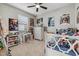 Bright bedroom with a full-size bed and plenty of storage at 6519 Rosehill Farm Run, Bradenton, FL 34211