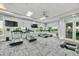 Modern gym with treadmills and large windows at 6519 Rosehill Farm Run, Bradenton, FL 34211