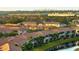 Aerial view of townhouses by the lake at 7022 Prosperity Cir # 801, Sarasota, FL 34238