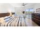 Guest bedroom with two twin beds, balcony access, and plenty of storage at 7022 Prosperity Cir # 801, Sarasota, FL 34238