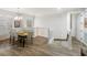 Upper-level dining area with a loft and a staircase at 7022 Prosperity Cir # 801, Sarasota, FL 34238