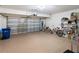 Spacious garage with room for bikes, storage, and a large overhead door at 7022 Prosperity Cir # 801, Sarasota, FL 34238