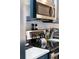 Stainless steel appliances and sleek countertops in this well-equipped kitchen at 7022 Prosperity Cir # 801, Sarasota, FL 34238