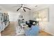 Spacious living room with comfortable seating and a large TV at 7022 Prosperity Cir # 801, Sarasota, FL 34238