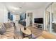 Open concept living room and kitchen with hardwood floors at 7022 Prosperity Cir # 801, Sarasota, FL 34238