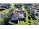Luxury home with tile roof, pool, and large backyard in a quiet cul-de-sac at 7419 Albert Tillinghast Dr, Sarasota, FL 34240