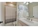 Clean bathroom with single sink and shower/tub combo at 7419 Albert Tillinghast Dr, Sarasota, FL 34240