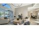Cozy living area with large windows and pool view at 7419 Albert Tillinghast Dr, Sarasota, FL 34240