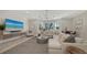 Comfortable living room with large sectional sofa and big screen TV at 7419 Albert Tillinghast Dr, Sarasota, FL 34240