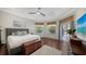Spacious main bedroom with hardwood floors and private access to backyard at 7419 Albert Tillinghast Dr, Sarasota, FL 34240