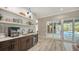 Modern wet bar with ice maker and beverage fridge at 7419 Albert Tillinghast Dr, Sarasota, FL 34240