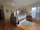 Guest bedroom with wood floors and window seating at 817 S Green Cir, Venice, FL 34285