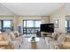 Spacious living room with water views and comfortable seating at 826 Bahia Del Sol Dr # 55, Ruskin, FL 33570