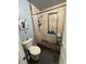 Bathroom with shower and toilet at 1007 Longfellow Cir, Sarasota, FL 34243