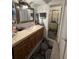 Bathroom with single sink vanity and shower stall at 1007 Longfellow Cir, Sarasota, FL 34243