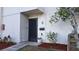 Condo building exterior showcasing the entrance and surrounding landscape at 1007 Longfellow Cir, Sarasota, FL 34243