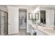 Spa-like bathroom with double vanity and walk-in shower at 10522 Eclipse St, Sarasota, FL 34241