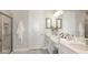 Bathroom with double vanity, large shower and linen closet at 10522 Eclipse St, Sarasota, FL 34241
