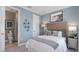Bedroom with ensuite bathroom and light blue walls at 10522 Eclipse St, Sarasota, FL 34241