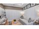 Bright home office with built-in shelving and comfortable seating at 10522 Eclipse St, Sarasota, FL 34241