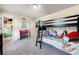 bedroom with bunk bed, closet, and toy storage at 1379 E Price Blvd, North Port, FL 34288