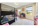 Bright bedroom with bunk bed and large windows at 1379 E Price Blvd, North Port, FL 34288