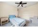 Bedroom with ceiling fan and neutral color scheme at 1379 E Price Blvd, North Port, FL 34288