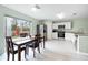 Bright dining area with sliding glass doors leading to backyard at 1379 E Price Blvd, North Port, FL 34288