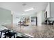 Modern kitchen with stainless steel appliances and granite countertops at 1379 E Price Blvd, North Port, FL 34288