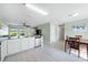 Open concept kitchen and dining area with island and stainless steel appliances at 1379 E Price Blvd, North Port, FL 34288