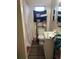 Clean bathroom with a shower/tub combo and updated flooring at 1519 30Th St, Sarasota, FL 34234