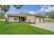 Updated condo with 2-car garage, screened patio, and well-manicured lawn at 205 Oak Hill Dr # 7, Sarasota, FL 34232