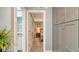 Hallway view of the home's interior, with access to bedrooms and bathroom at 205 Oak Hill Dr # 7, Sarasota, FL 34232