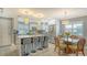Modern kitchen boasts a large island and stainless steel appliances at 205 Oak Hill Dr # 7, Sarasota, FL 34232